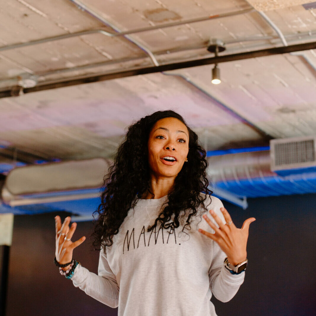 Women inspired and motivated talking to an audience